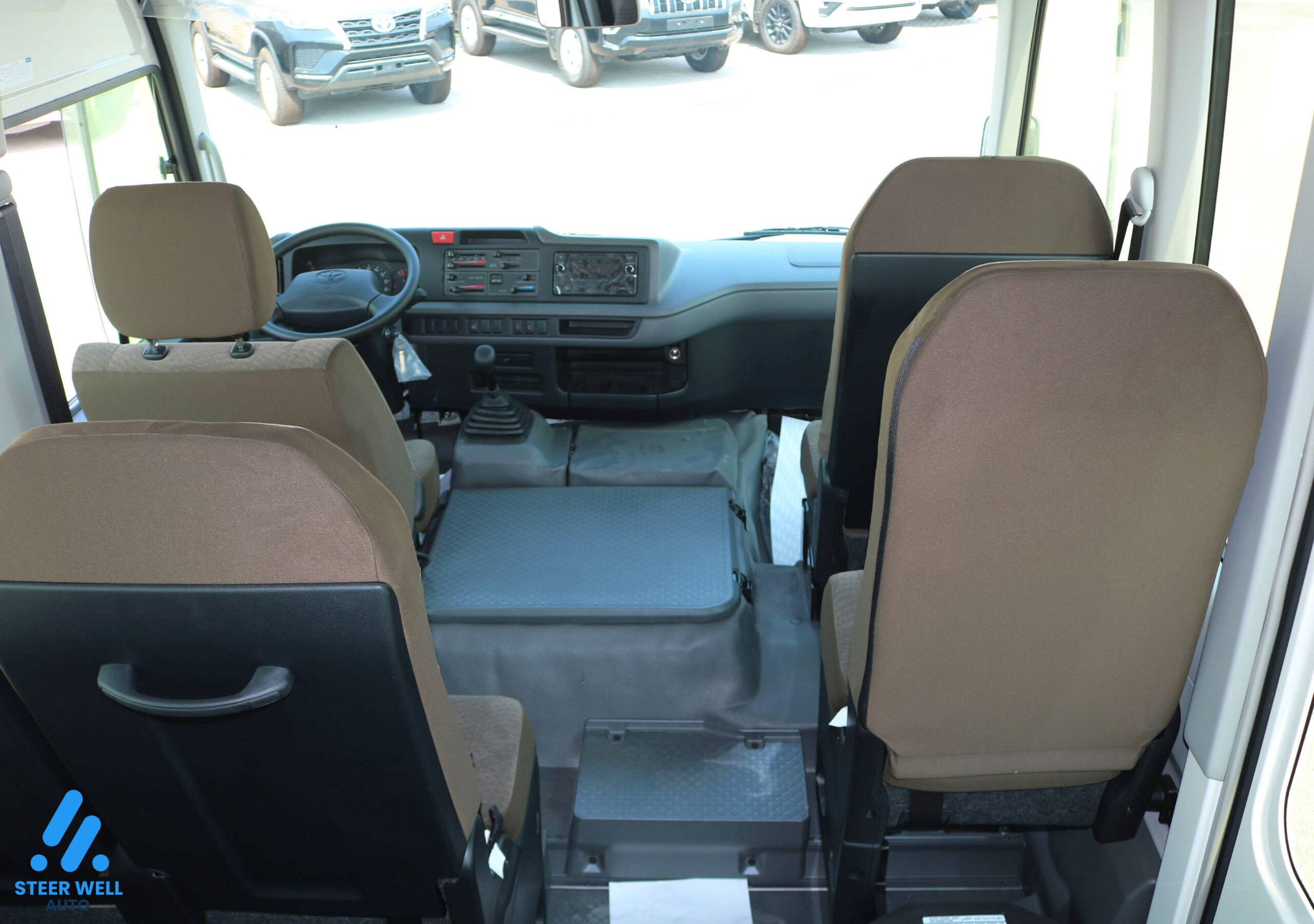 Toyota Coaster 2024 23 Seater  – White