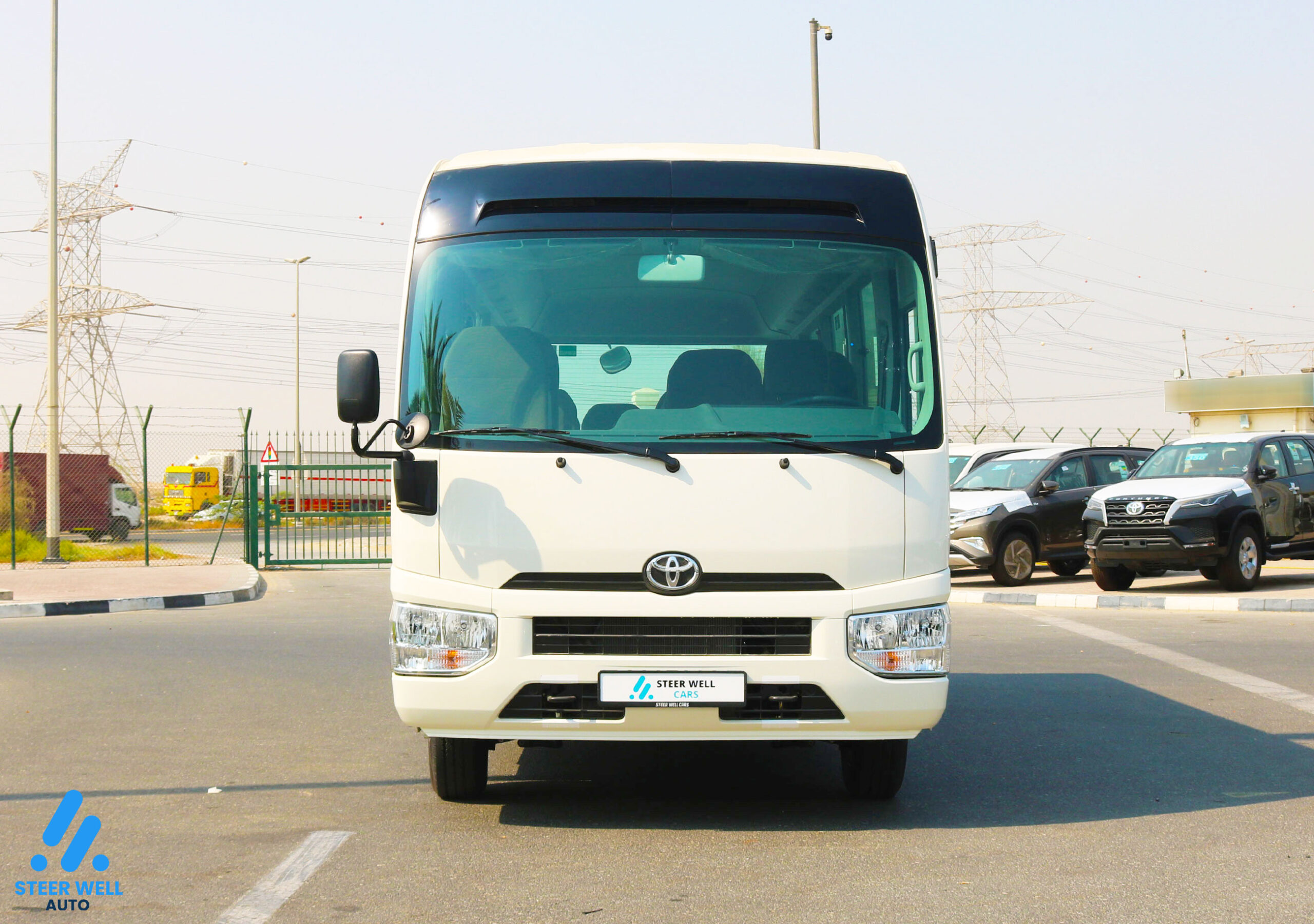 Toyota Coaster 2024 23 Seater  – White