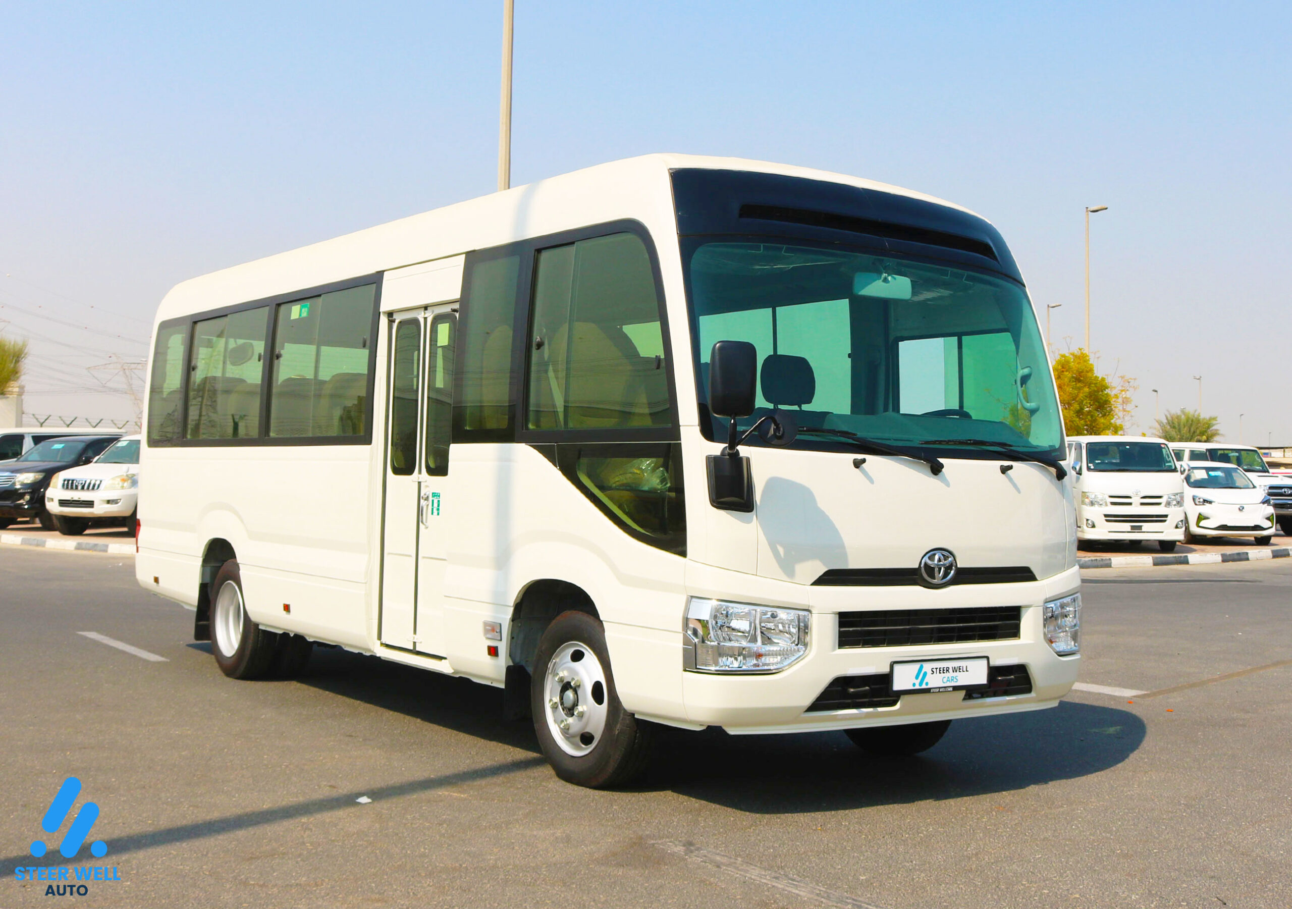 Toyota Coaster 2024 23 Seater  – White