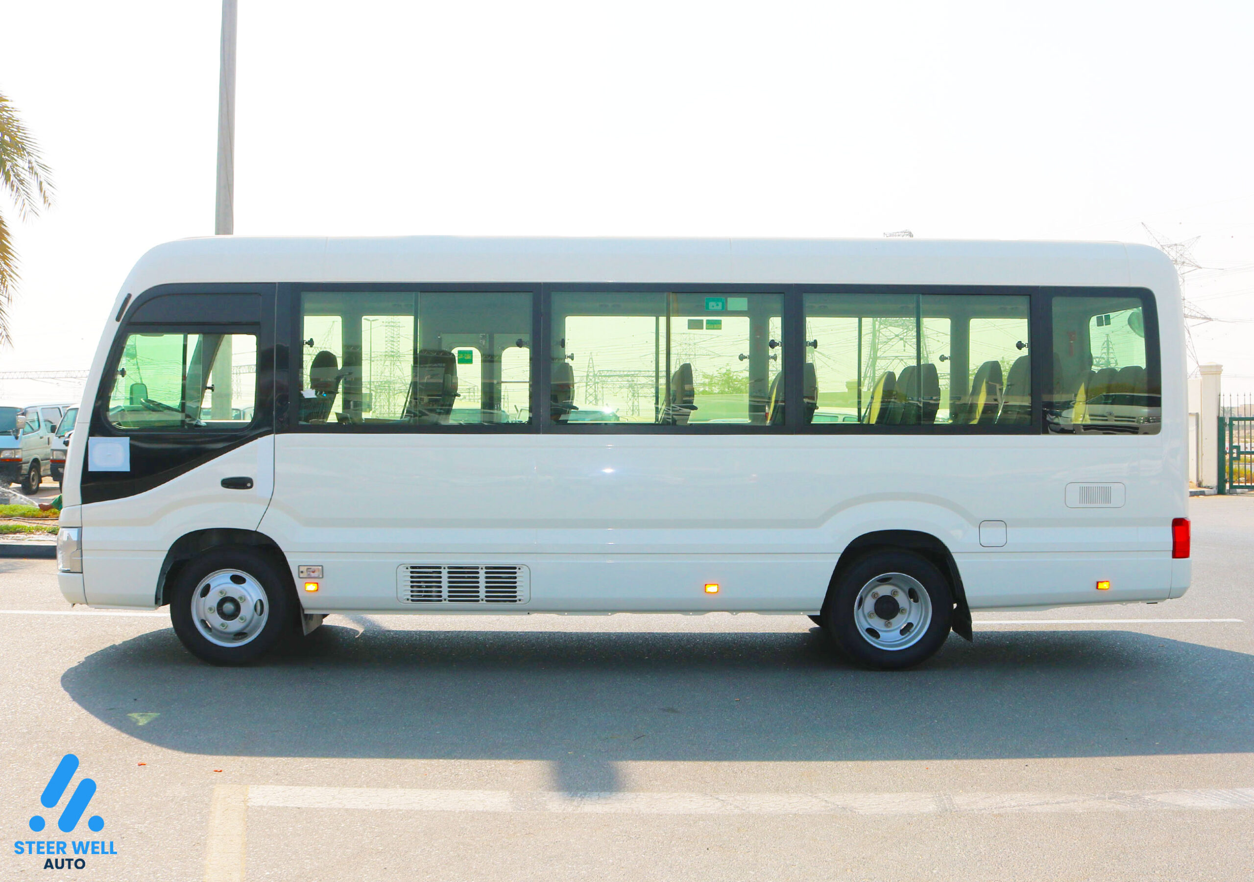 Toyota Coaster 2024 23 Seater  – White
